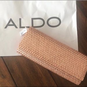 ALDO Rose gold woven clutch